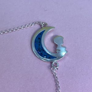 Pulsera Luna con niño relleno de leche y cordon